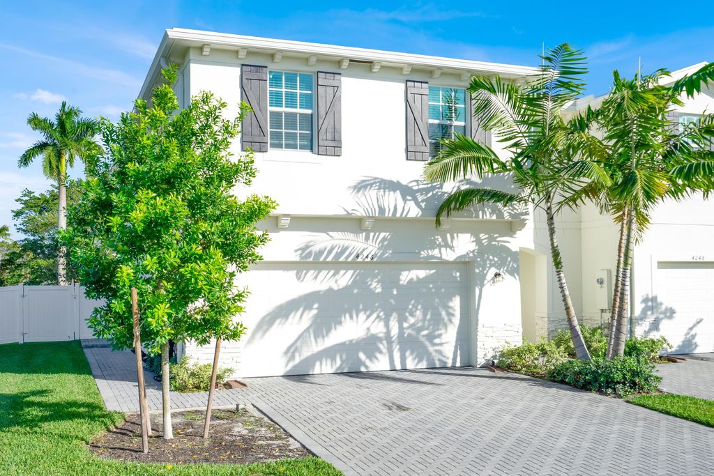 Photo of 4246 Lagoon Shore Drive, Lake Worth, FL 33467 (MLS # B26030198)