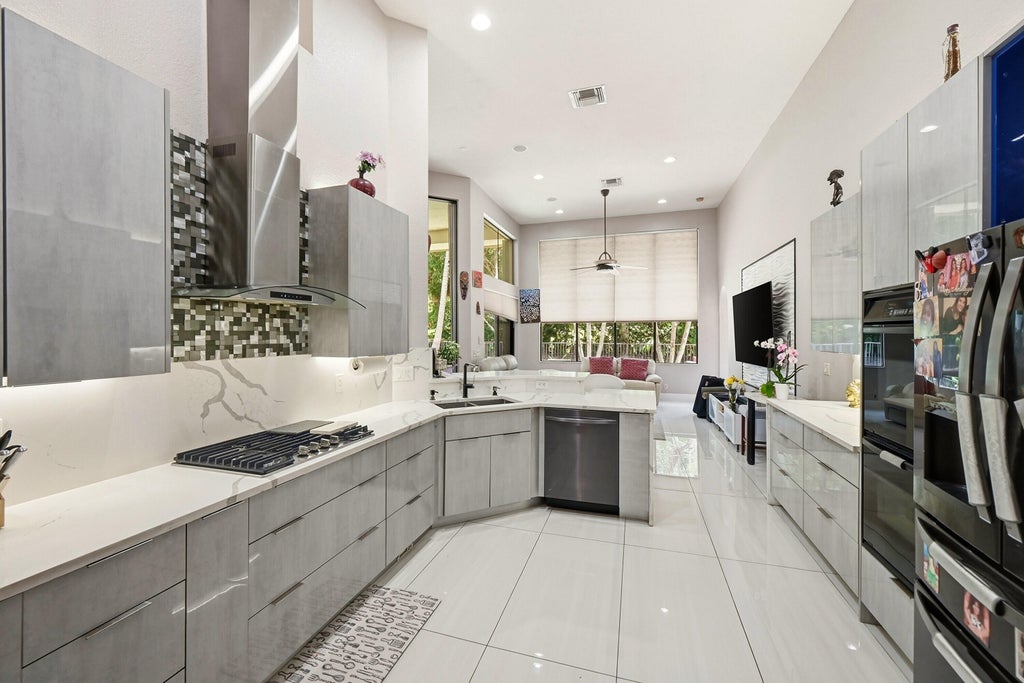 Photo of 10340 Trianon Place, Wellington, FL 33449 (MLS # B26075193)