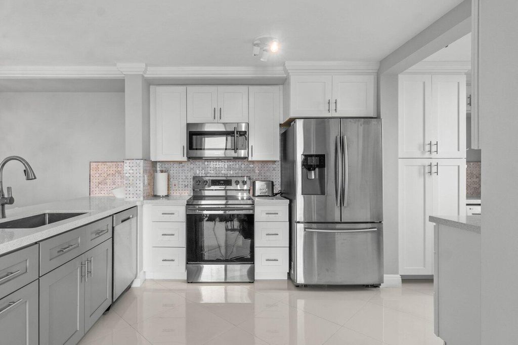 Photo of 180 Yacht Club Way #102, Hypoluxo, FL 33462 (MLS # R11143911)