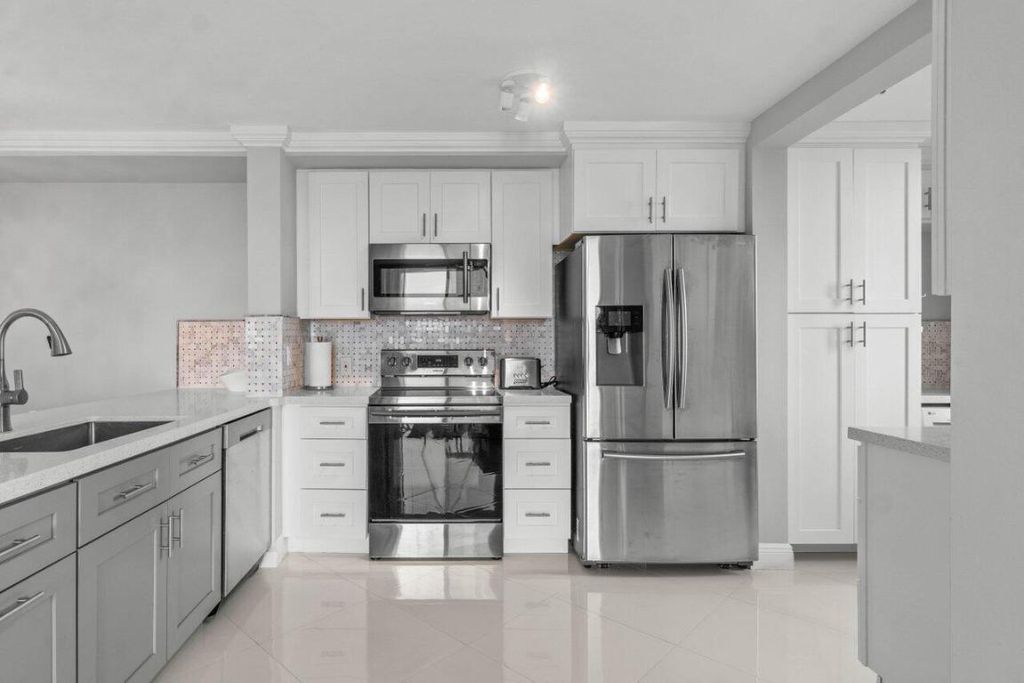 Photo of 180 Yacht Club Way #102, Hypoluxo, FL 33462 (MLS # R11143911)