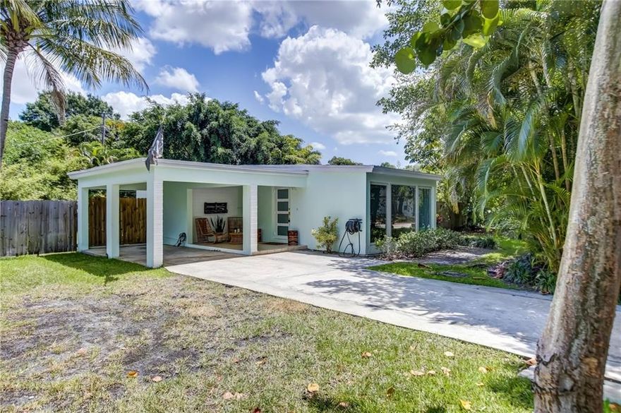 You don't want to miss this 3-bedroom, 2-bathroom single family home located in a highly sought-after community. The location is convenient with easy access to Downtown,  I-95, Las Olas, the airport, and the beaches.  The house features a remodeled kitchen and bathrooms. Large impact windows that let in plenty of natural light and give the home a bright and airy feel.  New wood laminate floors. Vaulted ceiling.  New electric and plumbing. LED lighting. The stove, refrigerator and lights can be controlled through your phone.  EV charging.  Private, fenced yard with paver patio.  Room to park a boat.  Shows well!  Don't miss it!