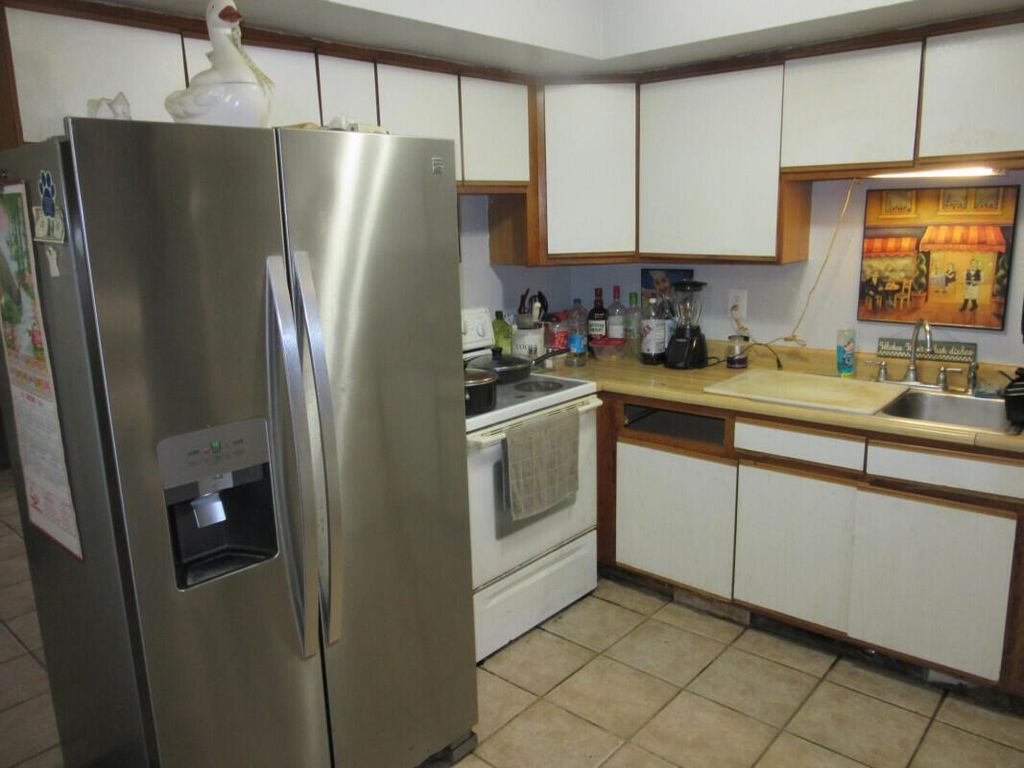 Photo of 773 Arlington Drive, West Palm Beach, FL 33415 (MLS # R11097244)