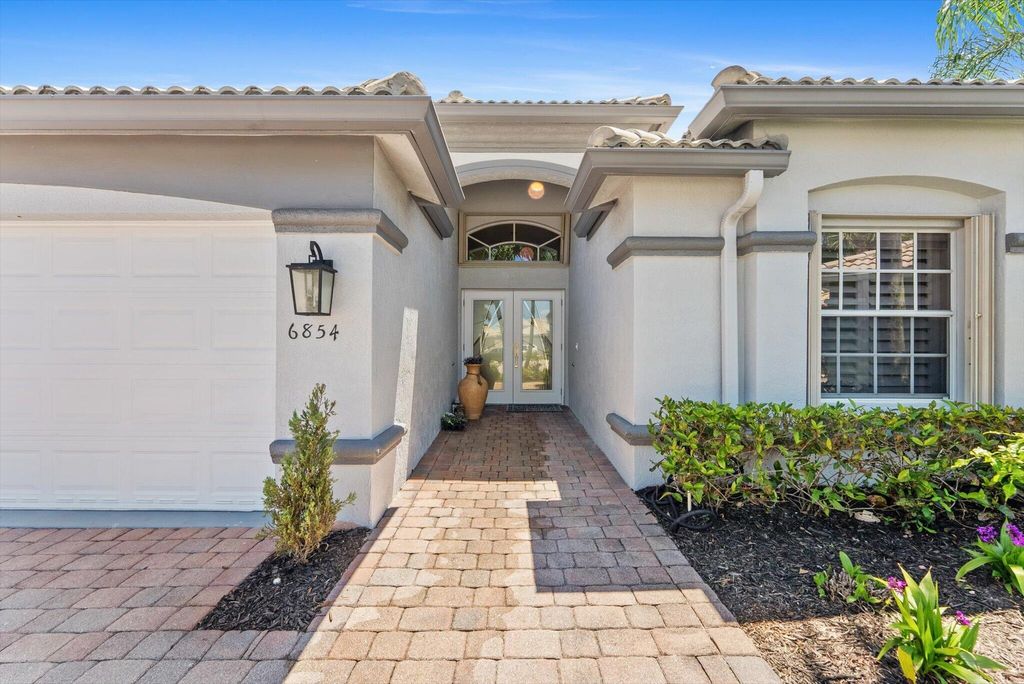 Photo of 6854 Rienzo Street, Lake Worth, FL 33467 (MLS # B26021443)