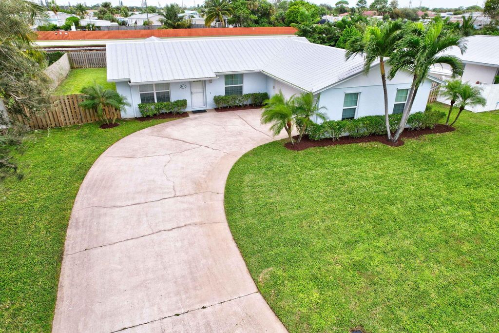 Photo of 8631 SE Sandcastle Circle, Hobe Sound, FL 33455 (MLS # R11029667)