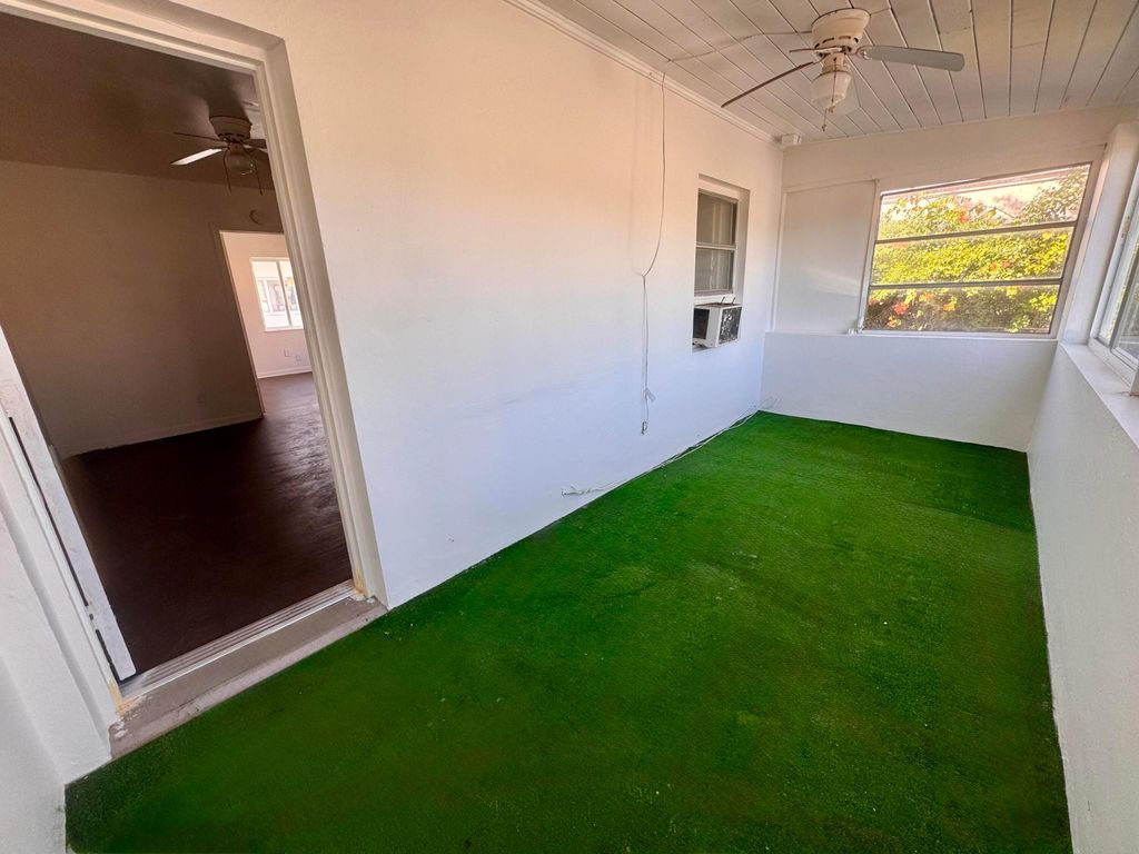 Photo of 2515 Avenue E, Riviera Beach, FL 33404 (MLS # B26029898)