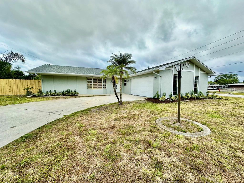 Photo of 2718 SE Mariposa Avenue, Port Saint Lucie, FL 34952 (MLS # R10980868)