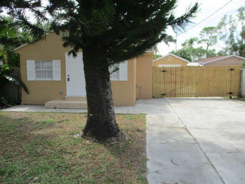 Photo of 4398 Whispering Pines Road Rd, West Palm Beach, FL 33406 (MLS # R10833836)