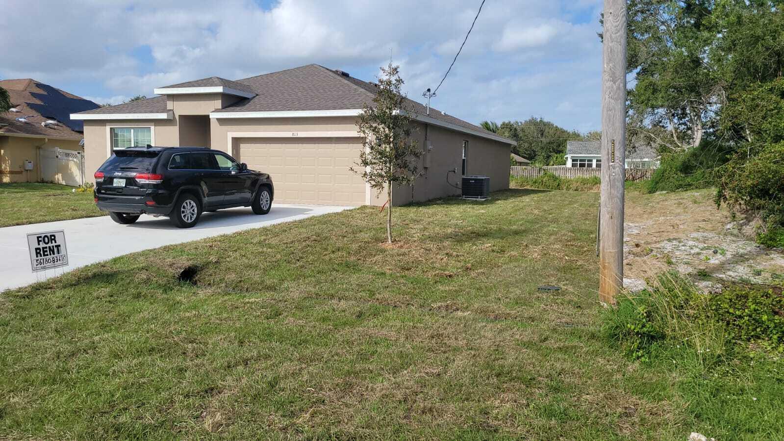 New Beautiful 4 bedroom 2 bath ranch home with spacious family room that expands to a casual dining area and an open kitchen with island . This home is situated on a large property perfect for BBQ's and children and pets to play in. All bedrooms feature oversized closets for extra appliances, 2 car garage and 4 CAR driveway. Close to good schools ,Walmart ,Publix ,Home Depot, restaurants, banks and more.Short term Seasonal rental for $3700 per month, Dec,Jan Feb, March, April. Minimum 30 days. For long-term rental we can consider lowering the price of the monthly payment.Price negotiable in case of long-term rental. New Home built in 2022. Short Term lease possible.About a 20-minute drive to the amazing Jensen Beach. There is no restriction for animals.