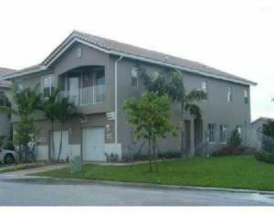 Beautiful 2 bedroom, 2 bath townhome with a 1 car garage. Wood flooring on stairs and bedrooms, tile in main living area. Spacious kitchen with granite counter and abundant cupboards. Balcony off living room.