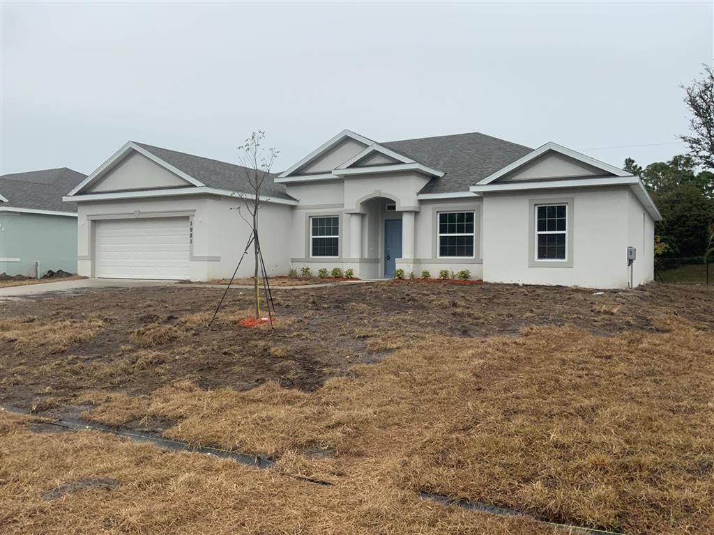 Photo of 1981 SW Janette Avenue, Port Saint Lucie, FL 34953 (MLS # R10705452)