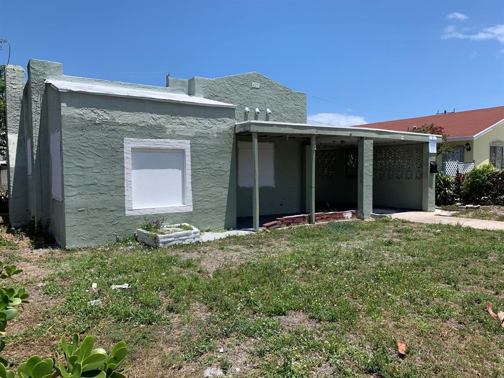 Photo of 427 Macy Street, West Palm Beach, FL 33405 (MLS # R10712036)