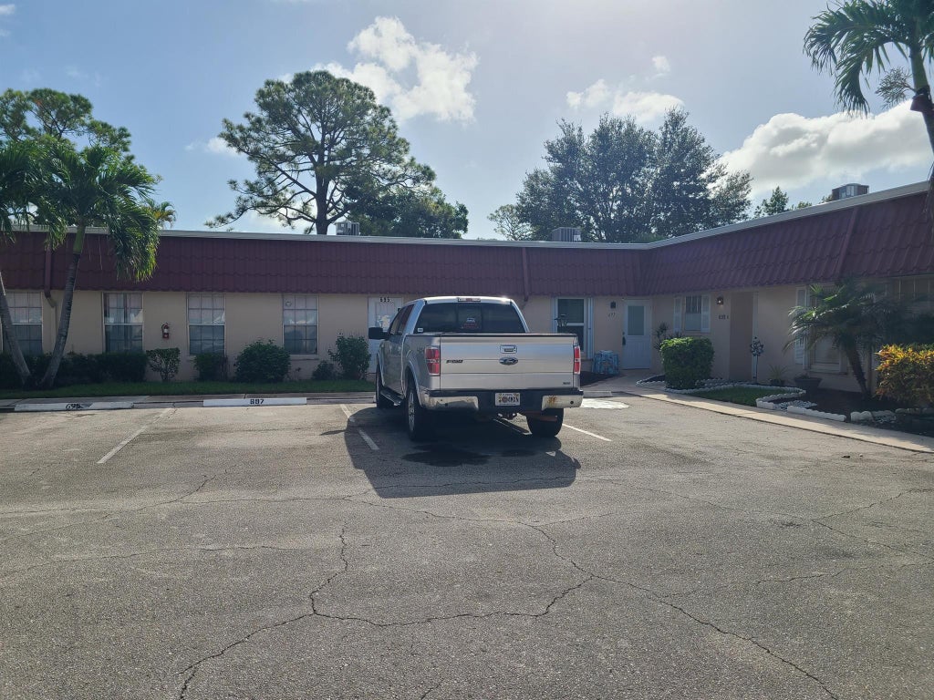 Photo of 697 Marlboro Oval, Lake Worth, FL 33467 (MLS # R11129227)