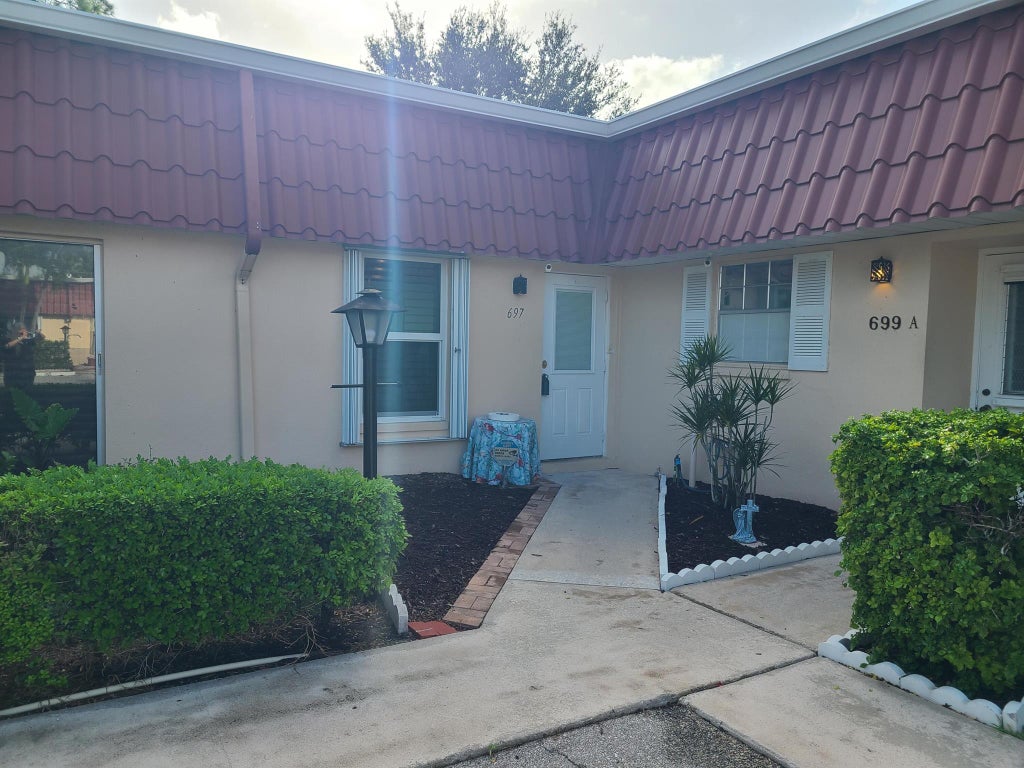 Photo of 697 Marlboro Oval, Lake Worth, FL 33467 (MLS # R11129227)