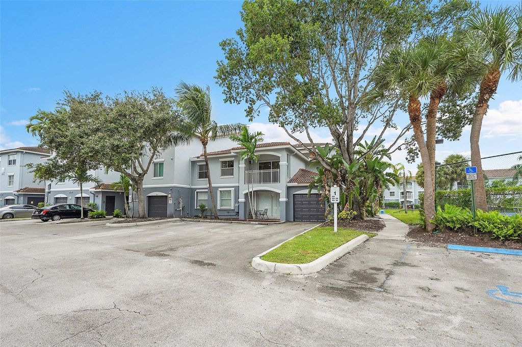 Photo of 9645 NW 1st Court #1-210, Pembroke Pines, FL 33024 (MLS # F10526141)