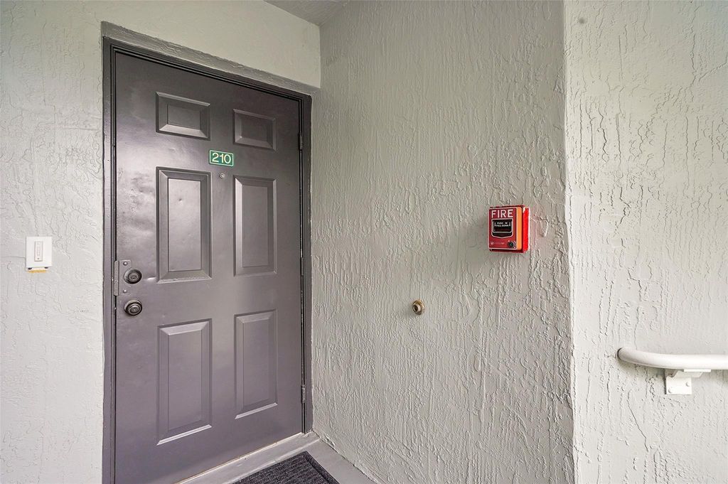 Photo of 9645 NW 1st Court #1-210, Pembroke Pines, FL 33024 (MLS # F10526141)