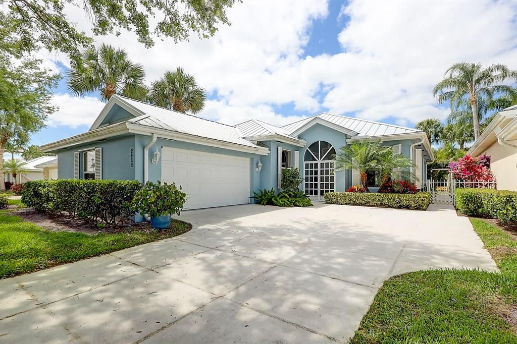 Photo of 2855 SW Brighton Way, Palm City, FL 34990 (MLS # R10874401)