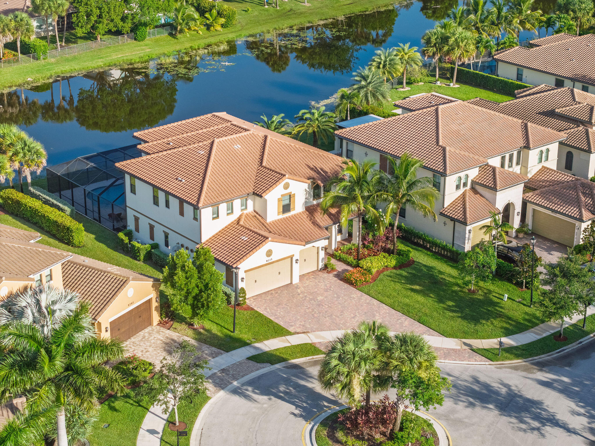 Step inside your future sanctuary--a sparkling 4,716 sq ft modern retreat in Heron Bay, boasting 5 bedrooms and 6 baths on a generous 10,440 sq ft private lake-view lot. Imagine leisurely Florida mornings in a bright, open floorplan where natural light dances off artful finishes. Entertain or unwind by the huge screened-in custom pool and spa, perfectly designed for sunset gatherings and relaxation. Relish access to resort-style amenities--gated entry, pools, fitness, tennis, and clubs. This isn't just a home--it's the lifestyle you've been waiting for.