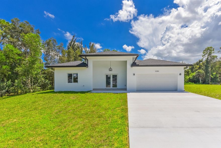 Be the First to Call This Brand New Luxury Residence Home! Electricity is included in the rent. This exceptional 4-bedroom, 3-bathroom custom-built estate sits on over an acre of fully sodded land in a peaceful, family-friendly neighborhood located on a quiet dead-end street in a rapidly growing western community. Thoughtfully designed and beautifully executed, this brand new construction has never been lived in and is ready for immediate occupancy -- offering the rare opportunity to enjoy the comfort and security of a truly pristine home.As you arrive, you're welcomed by an oversized concrete driveway and an impressive double-door main entry, setting the tone for the quality and attention to detail found throughout the home.