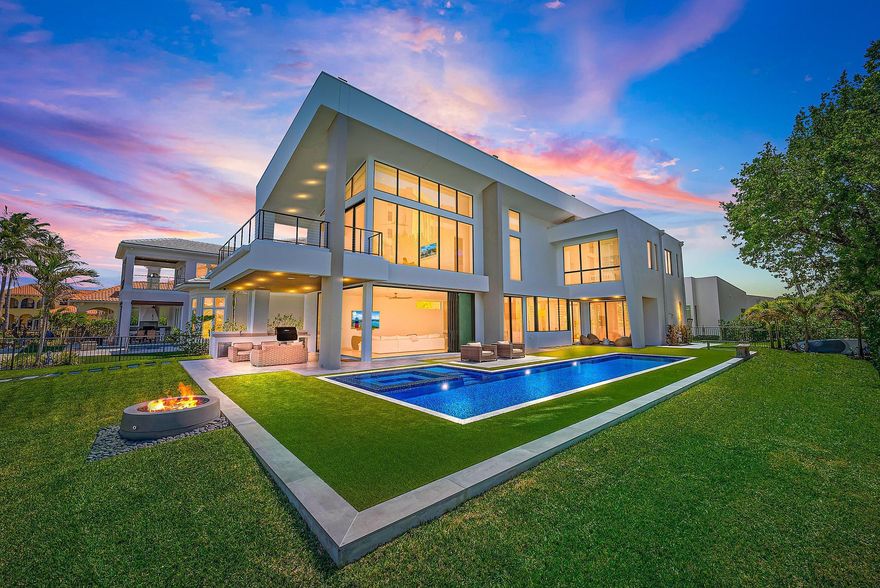 JUPITER'S MOST EXTRAORDINARY GEM IS FINALLY AVAILABLE!This exceptional residence is situated on .5 acre & approximately 180ft of stunning Bahama blue waterways directly on the Jupiter Intracoastal, featuring the nation's most epic views of the legendary Jupiter Island. Recently developed by renowned Rothrock Construction & esteemed Affiniti Architects, this property offers a perfect combo of timeless sophistication & warmth. Located in a private enclave of Jupiter with a friendly neighborhood feel & NO HOA! Enjoy the true essence of Florida Living with the open floor plan complete with intracoastal views & ocean breezes from virtually every angle. This elite estate features 7,700 TSF designed with a main house 4 BD/4 BA & separate guest house with 1 BD/1 BA & kitchen (5BD total).