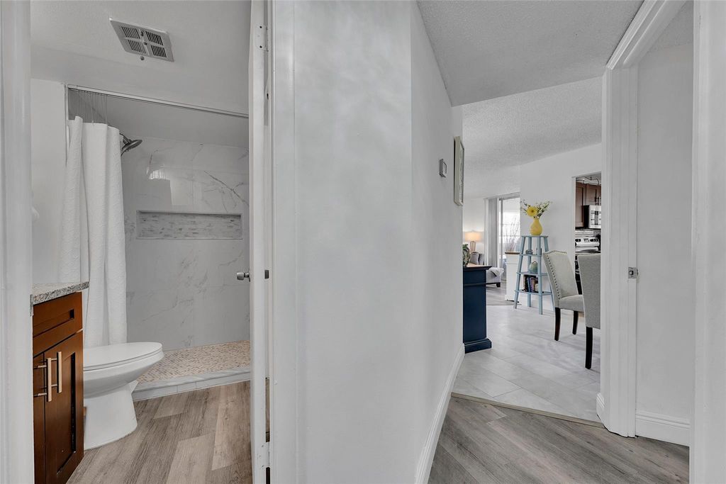 Photo of 9090 Lime Bay Boulevard #112, Tamarac, FL 33321 (MLS # B26045231)