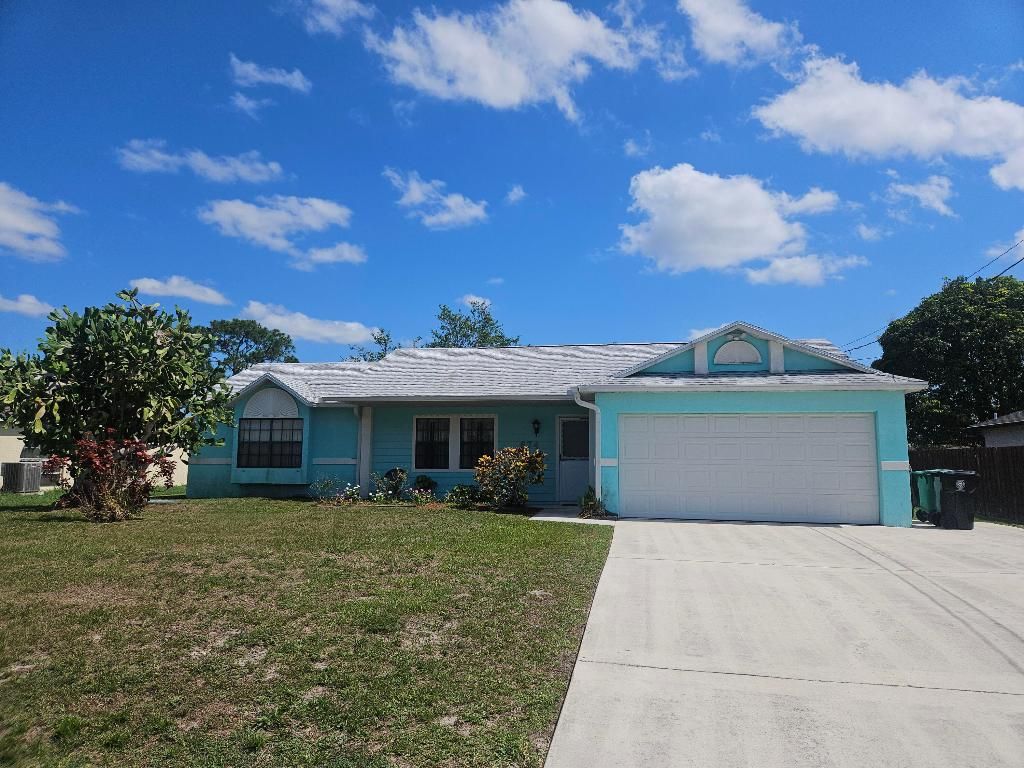 Photo of 674 SW Violet Avenue, Port Saint Lucie, FL 34983 (MLS # R10992489)
