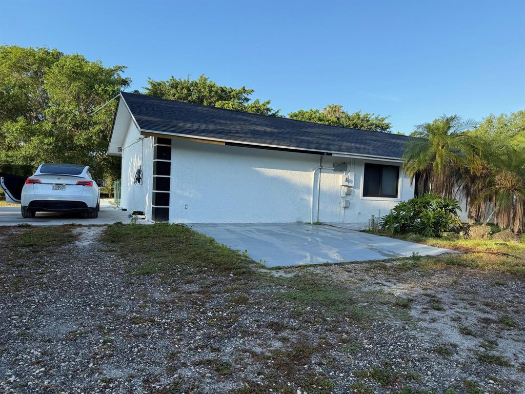 Photo of 13530 52nd Court N, West Palm Beach, FL 33411 (MLS # R11087382)