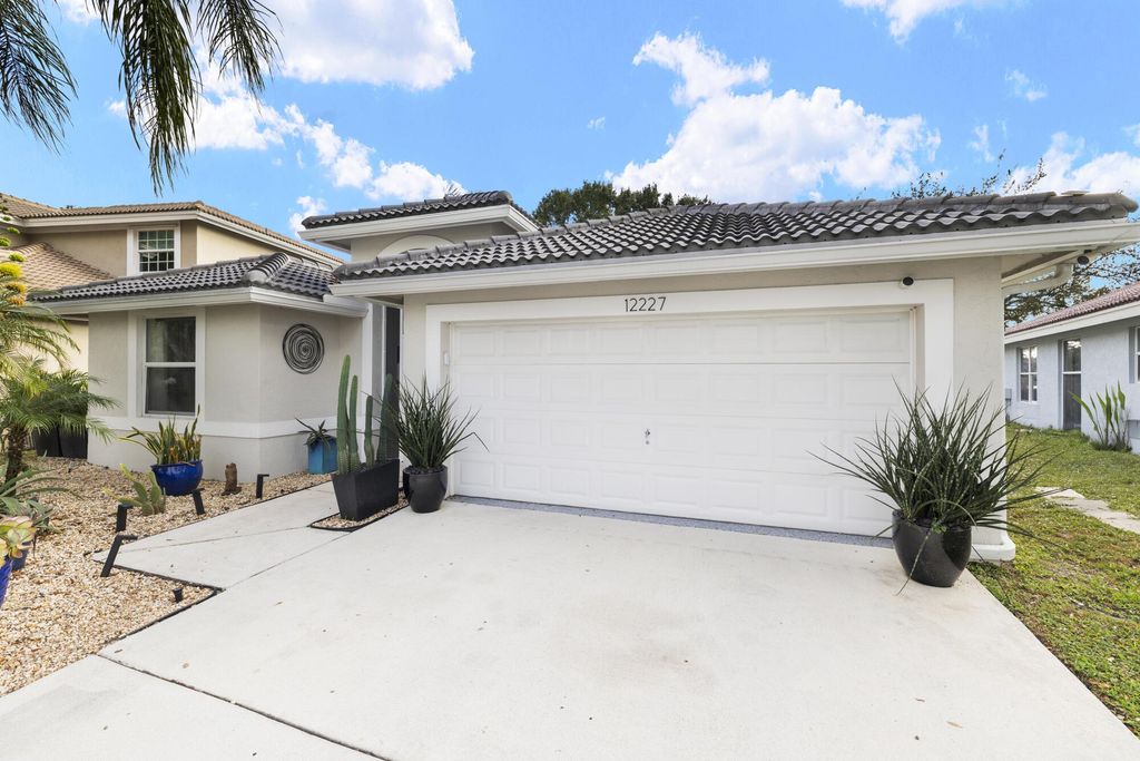 Photo of 12227 Sunset Point Circle, Wellington, FL 33414 (MLS # R11143573)