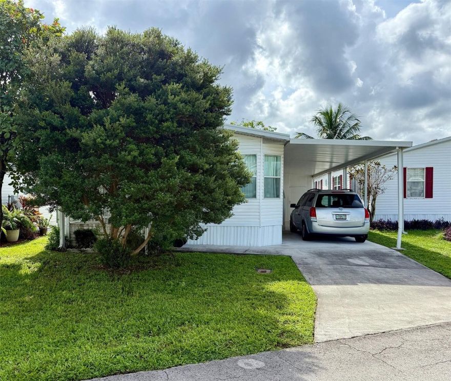 2005 double wide on Canal with large bedrooms, great location, screen porch, shed, carport and much more. You own your own land in this community, no large rent fees, just a maintenance fee for the use of 3 pool, clubhouses, and activities.
