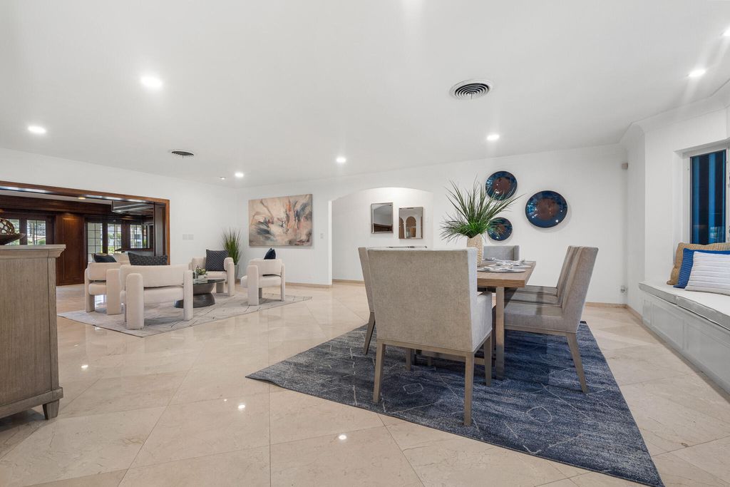 Photo of 57 Cayuga Road, Sea Ranch Lakes, FL 33308 (MLS # B26021018)