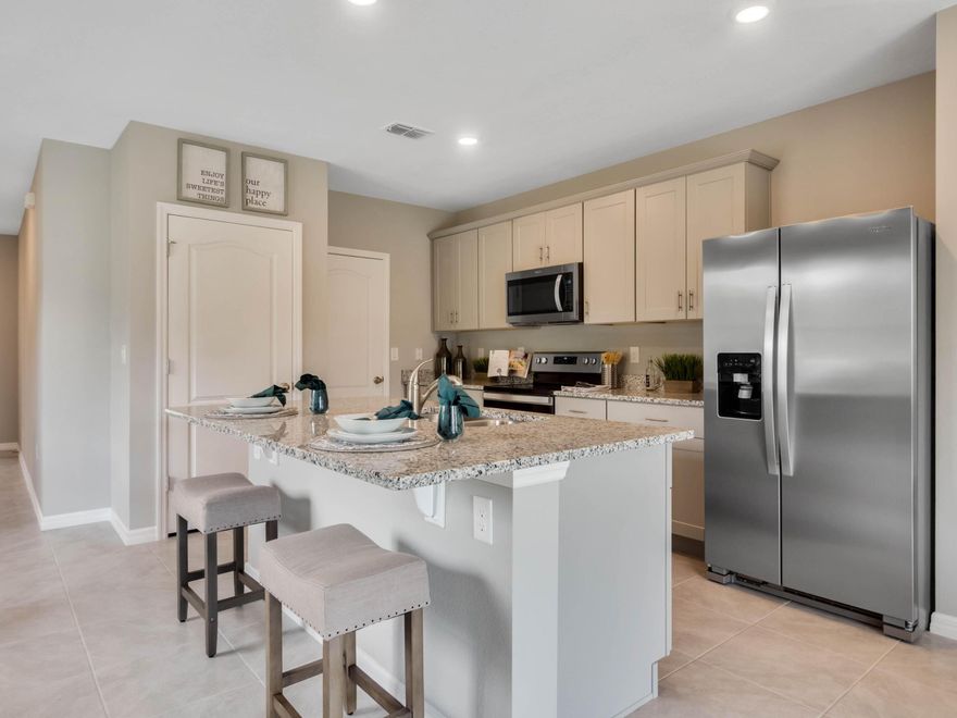 SHORT TERM AVAILABILITY! Spacious townhome featuring 3 Bedrooms, 2.5 Baths, one car garage, and a beautiful deck with no rear neighbors. As you enter the foyer you are welcomed with a powder room, an open floor plan featuring a large kitchen island, dining area and a large pantry. This townhome has upgraded stainless steel Whirlpool appliances and granite countertops. As you head up to the second floor you are greeted with open space and indoor laundry. The master suite impresses with a double bowl vanity, huge walk in closet and large shower space. You also have the two guest bedrooms that share a bathroom featuring granite countertops. The smart home technology in this home allows you to monitor certain features with your smart device at home or away. Bella Oaks community features include the following amenities: Park, Tot Lot, Walking - Nature Trails, Community Dock, Open Green Spaces, Winding Walkable Roads, and a Peaceful Fountain