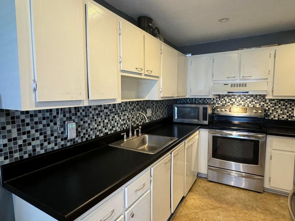 Photo of 1521 NW 18th Avenue #202, Delray Beach, FL 33445 (MLS # R11014297)