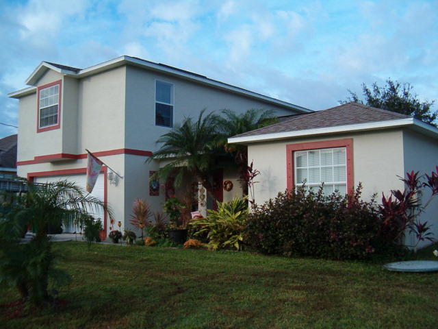 Spacious two story home with two Master Bedrooms - plenty of storage space - tiled throughout - fully fenced - easy show