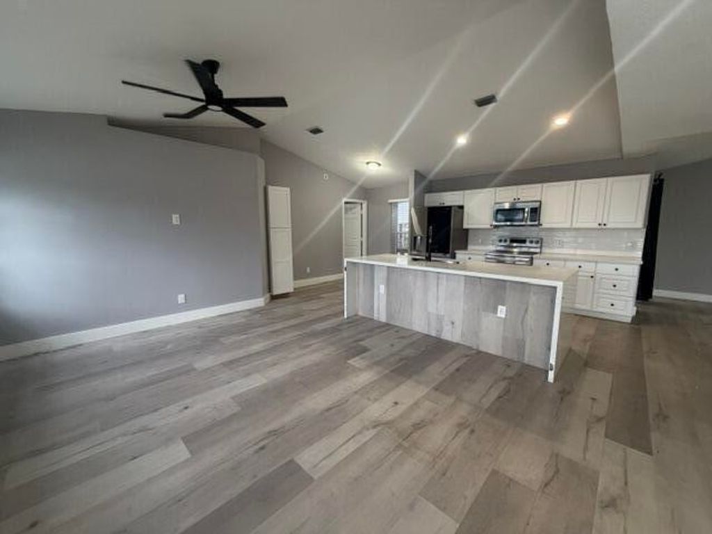 Photo of 1717 SW Burlington Street, Port Saint Lucie, FL 34984 (MLS # B26024474)