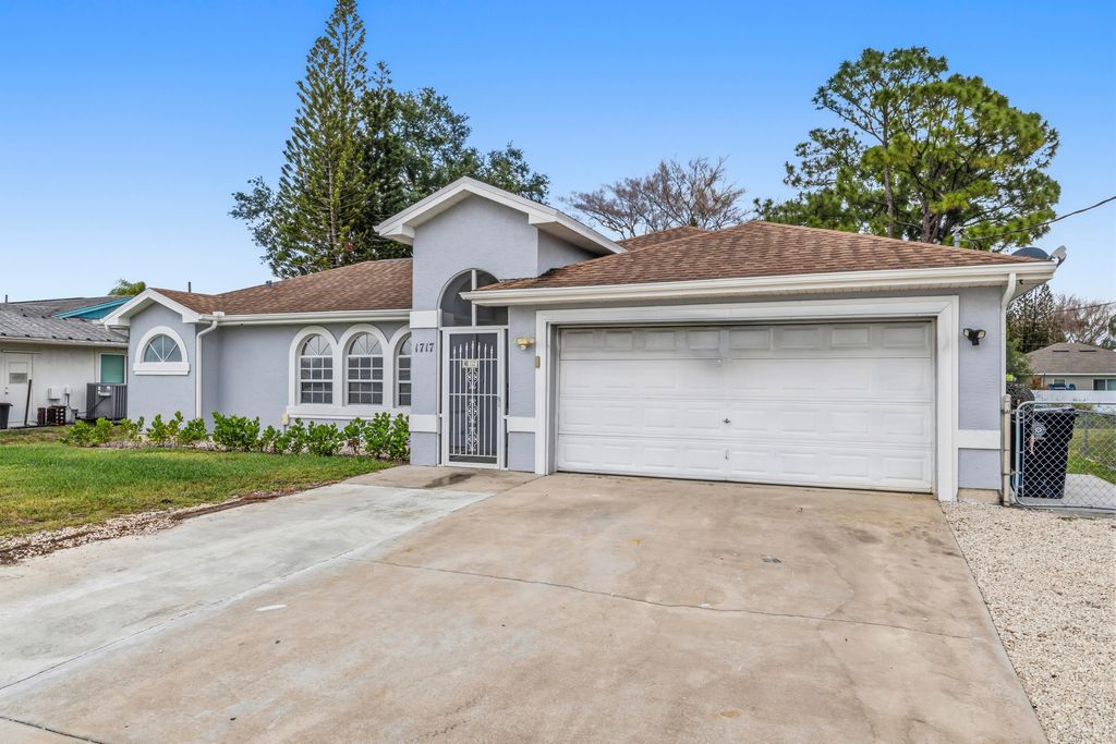 Photo of 1717 SW Burlington Street, Port Saint Lucie, FL 34984 (MLS # B26024474)