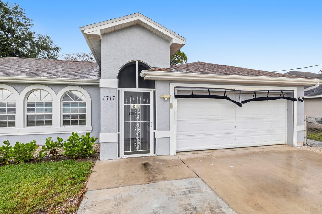 Photo of 1717 SW Burlington Street, Port Saint Lucie, FL 34984 (MLS # B26024474)