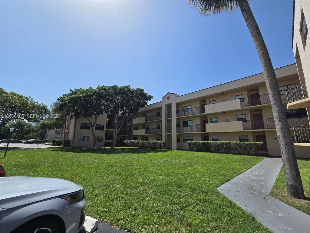 Photo of 3396 Foxcroft Road #113, Miramar, FL 33025 (MLS # A12069406)