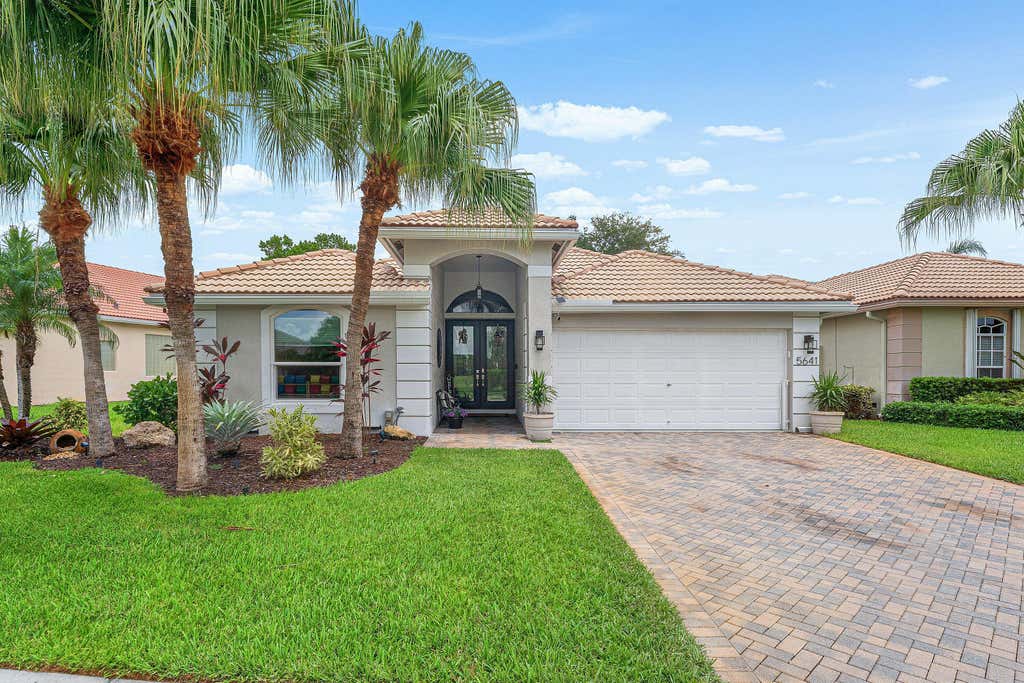 Photo of 5641 FOUNTAINS Drive S #5641, Lake Worth, FL 33467 (MLS # B26061677)