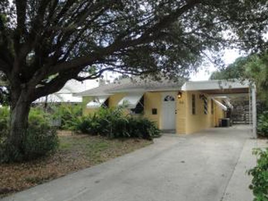 CHARMING BUNGALOW ON TREE LINED OLD NORTHWOOD STREET IN QUIET NEIGHBORHOOD.  Rare 2 bedroom unfurnished rental with enclosed Florida Room. Separate Laundry Room with New Washer+Dryer. Updated Kitchen and Bathroom.  Two large bedrooms. Security Alarm System. Great location close to Downtown West Palm Beach and nearby Hospital District on 45th Street.  Walking distance to West Palm Waterfront. Close to International Airport and I-95. Centrally located close to Palm Beach, CityPlace, Clematis Street and Palm Beach Lakes Outlet Mall.  Pet friendly fenced yard.