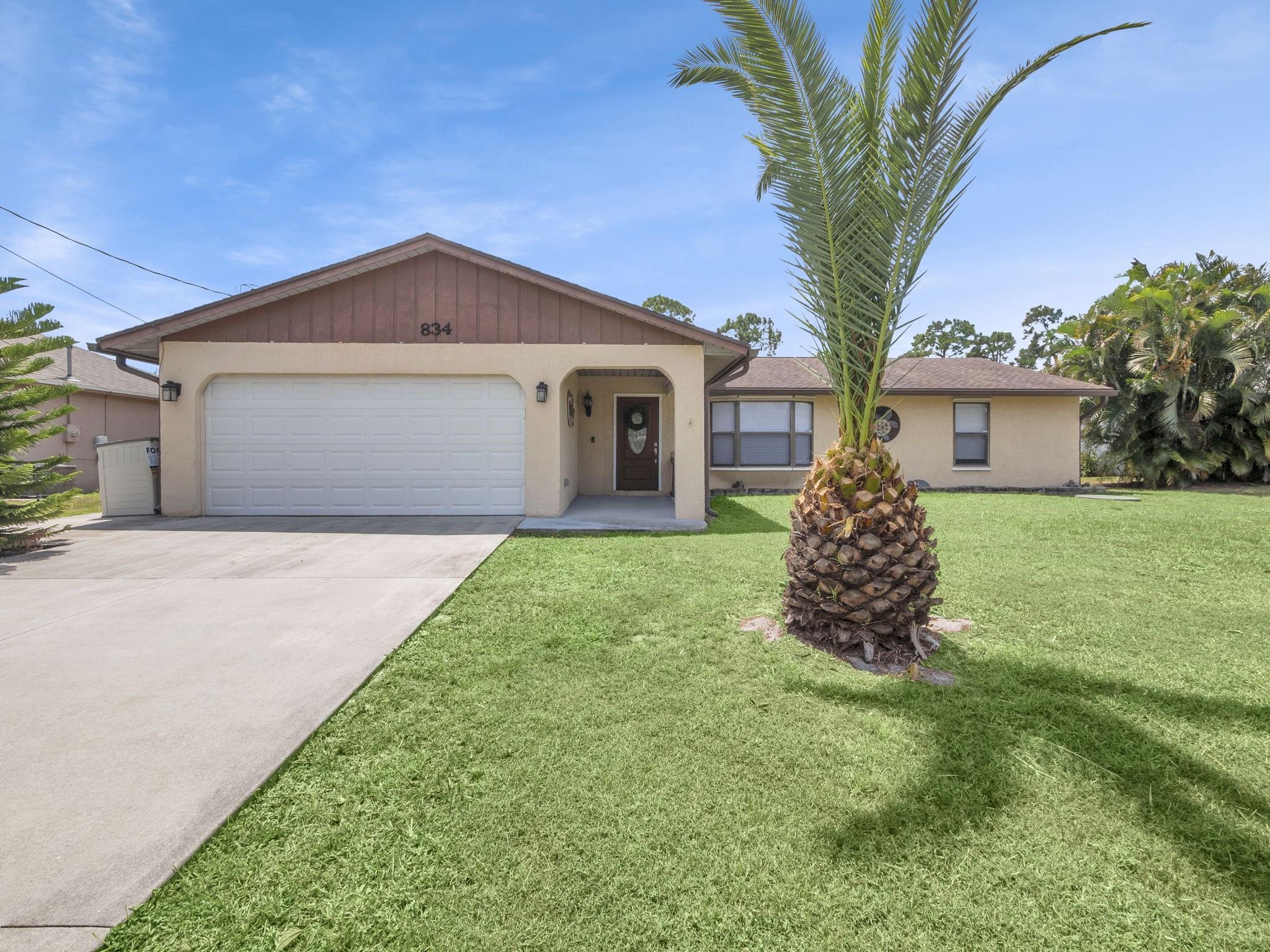 Amazing opportunity to own the POOL home with 3 bedrooms, 2.5-bath and 2-car garage. Wonderful floor plan with spacious living area complete with vinyl flooring, dining area with view of pool. This split plan offers privacy for the Owner's Suite with renovated bath and exit to pool. Two additional bedrooms easily accommodate family, guests or work from home. The kitchen has a window overlooking the outdoor area as well! The open-concept kitchen and dining area is open to the great room, the oversized lanai and pool create a prefect space for daily living and entertaining. The half bath located in the entrance from the garage to the home allowing a car enthusiast or woodworker a convenient feature. Perfect for an astute buyer looking for pool home close to all local conveniences!