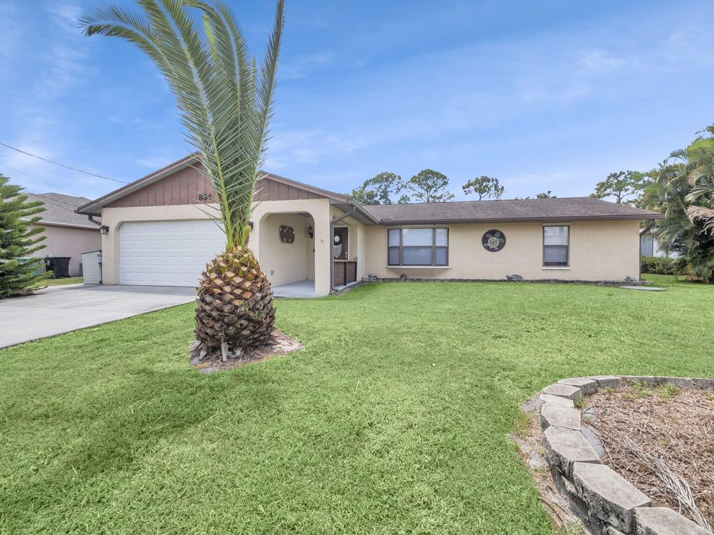 Photo of 834 SE Walters Terrace, Port Saint Lucie, FL 34983 (MLS # F10519641)