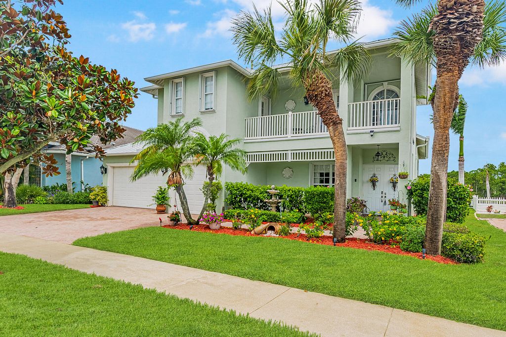 Photo of 205 NW Magnolia Lakes Boulevard, Port Saint Lucie, FL 34986 (MLS # B26037985)