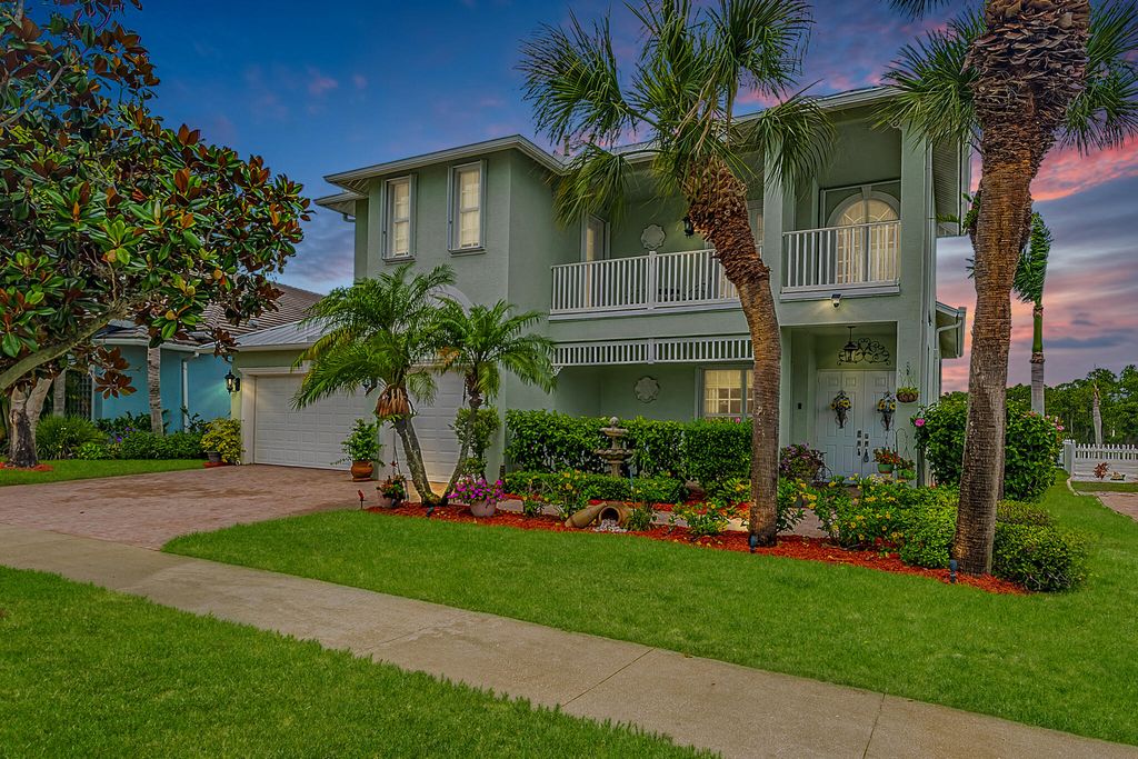 Photo of 205 NW Magnolia Lakes Boulevard, Port Saint Lucie, FL 34986 (MLS # B26037985)