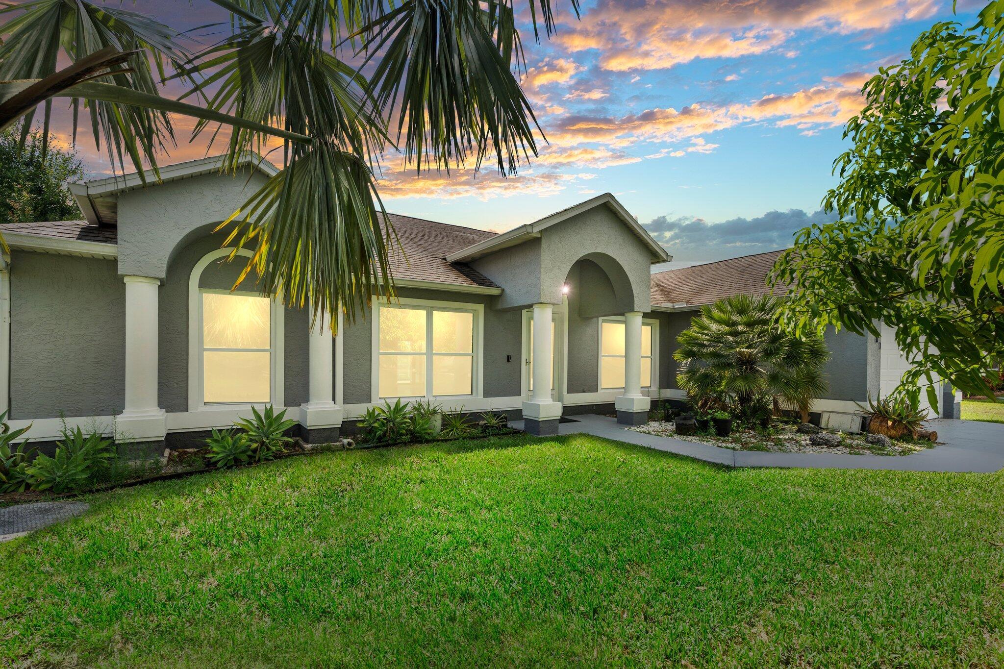 Discover this spacious and inviting 4-bedroom, 2-bath CBS home featuring a screened-in pool, vaulted ceilings, all IMPACT WINDOWS, and a smart, flexible layout. NO HOA! Park your boat/RV! The heart of the home includes a formal dining room and a large family room, perfect for entertaining or relaxing.Need more space? A versatile bonus room offers the potential for a 5th bedroom, office, or den. The updated cabana bath adds function and style, while ceramic tile and laminate flooring run throughout--no carpet to worry about! Fully fenced backyard, offering privacy and outdoor enjoyment. Ideally located near I-95, shopping,dining,and schools, this home is perfect for families or anyone seeking comfort and convenience.Schedule your showing today!