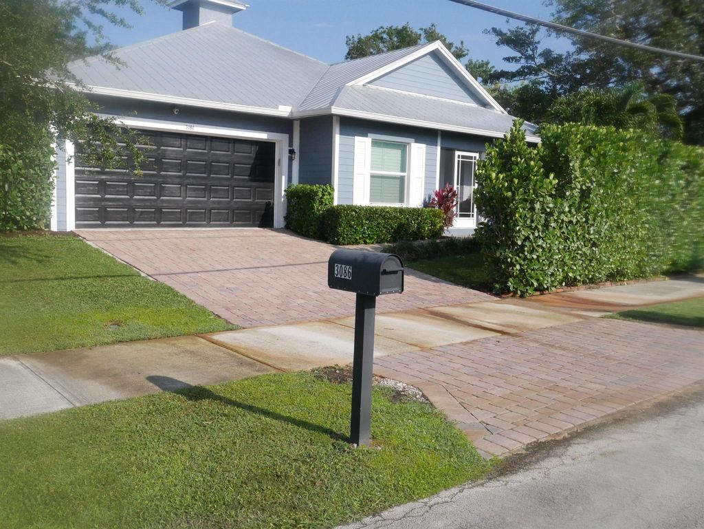 Photo of 3086 SW Feroe Avenue, Palm City, FL 34990 (MLS # R10897480)