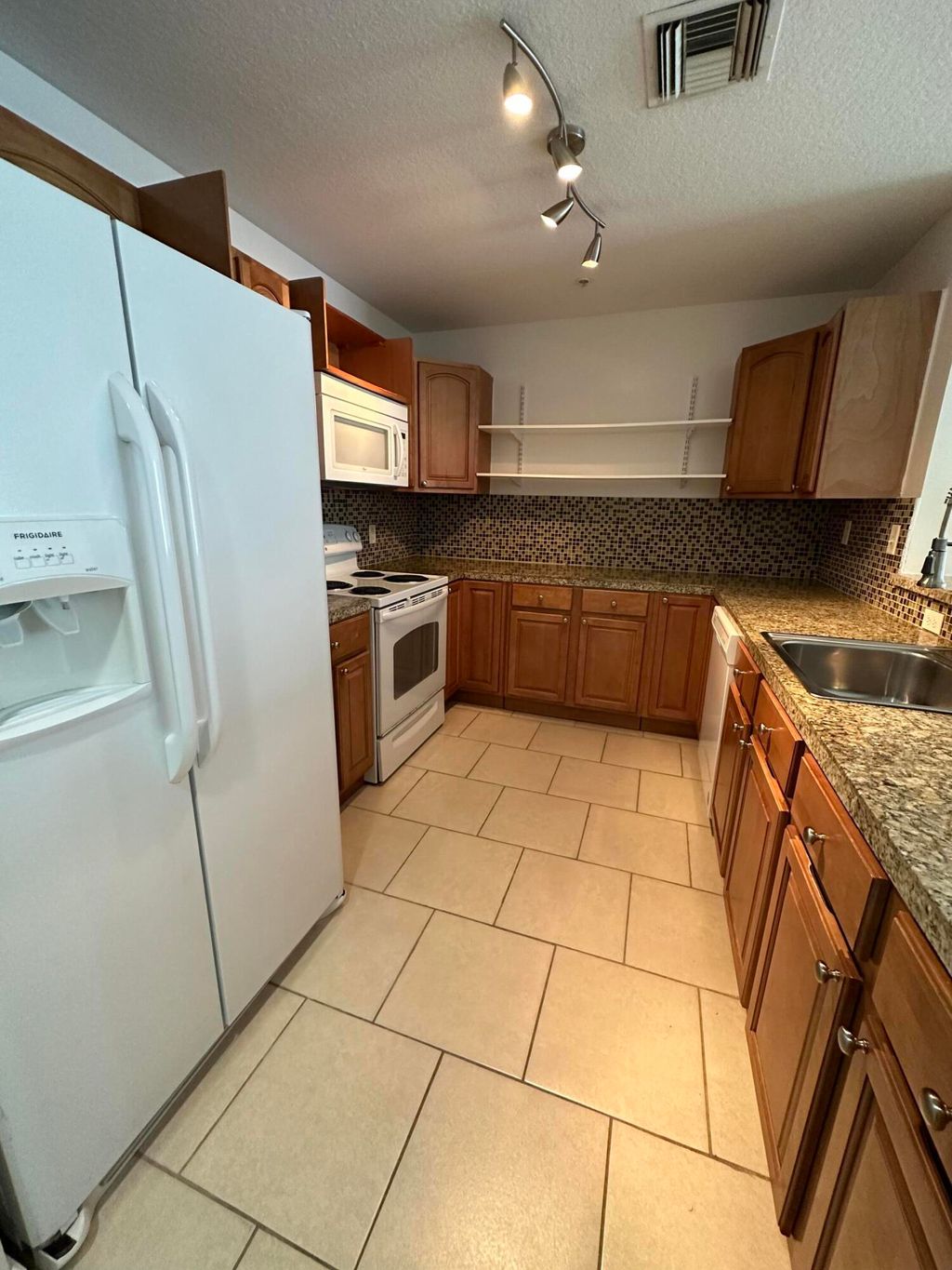 Photo of 1203 Town Center Drive, Jupiter, FL 33458 (MLS # B26015847)