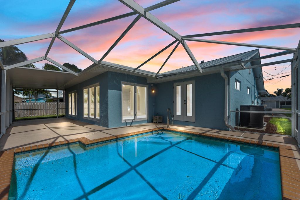 Photo of 1430 SW Albatross Way Way, Palm City, FL 34990 (MLS # R10813934)