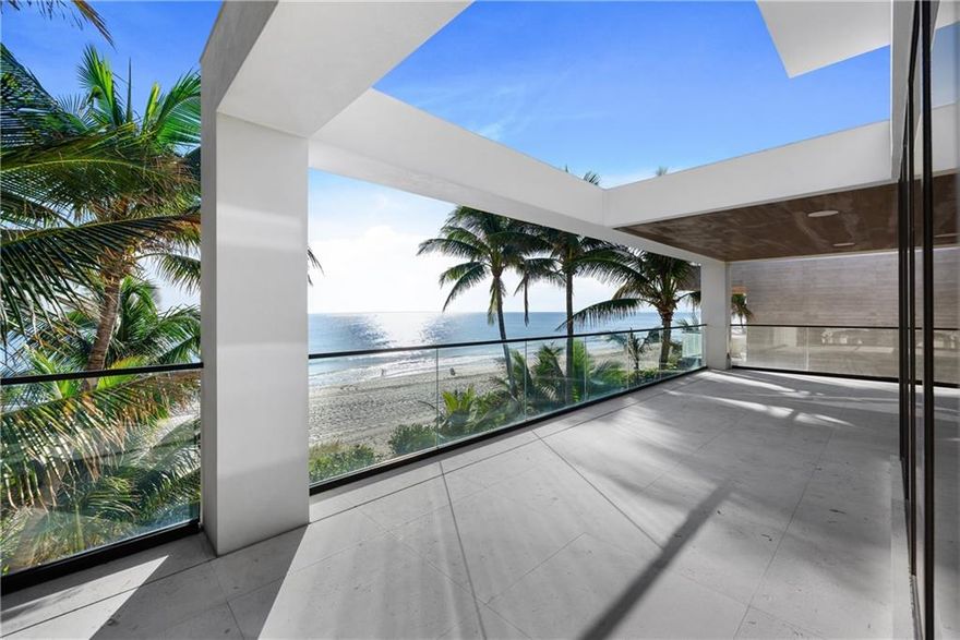 Luxury oceanfront living directly on the sand of Fort Lauderdale Beach. Bomar Builders has just completed construction on this new modern, custom residence on 50ft of sand showcasing expansive, breathtaking ocean views. This gorgeous 4BR | 5.5 BATH | 2 CAR three story residence has a commercial elevator and features a custom Italian kitchen with Miele appliances, stone slab encased fireplace, expansive balconies from the main living area as well as the master bedroom, glass walled en suite office, walnut and Italian porcelain flooring, home automation and more. The expansive master bedroom opens up to the spacious master balcony overlooking the heated, salt water pool and ocean. The master bathroom features custom his and her vanities, dressing table, large master shower and soaking tub.