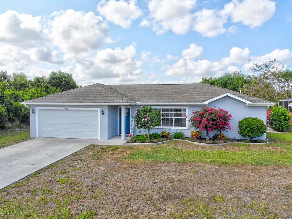 Photo of 831 SW Mccoy Avenue, Port Saint Lucie, FL 34953 (MLS # R10728225)
