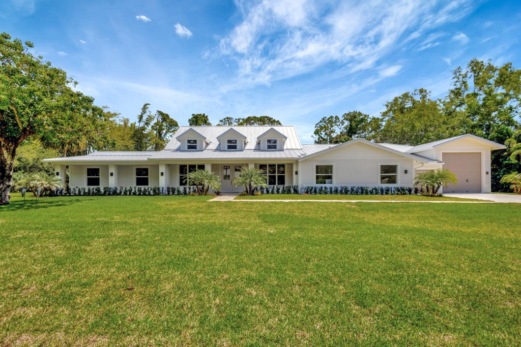 Photo of 15014 72nd Drive N, Palm Beach Gardens, FL 33418 (MLS # R11082924)