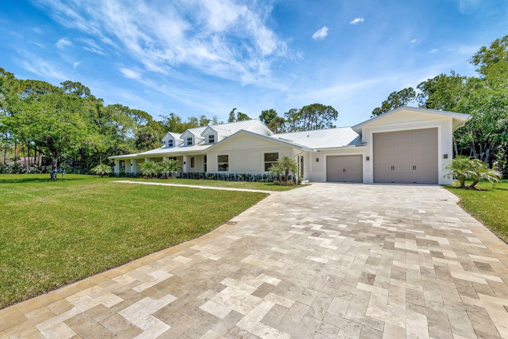 Photo of 15014 72nd Drive N, Palm Beach Gardens, FL 33418 (MLS # R11082924)